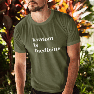 white man with sunglasses on wearing olive kratom is medicine shirt